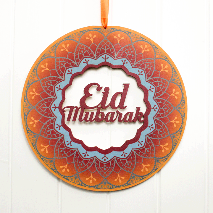 'Eid Mubarak' krans i trä